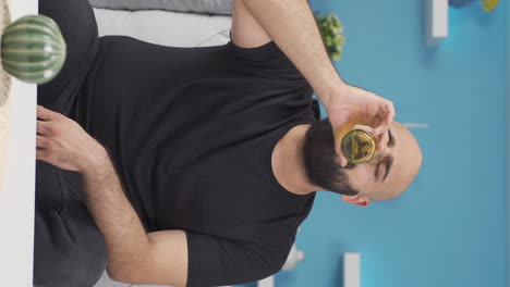 Vertical-video-of-Man-drinking-water-for-healthy-life.